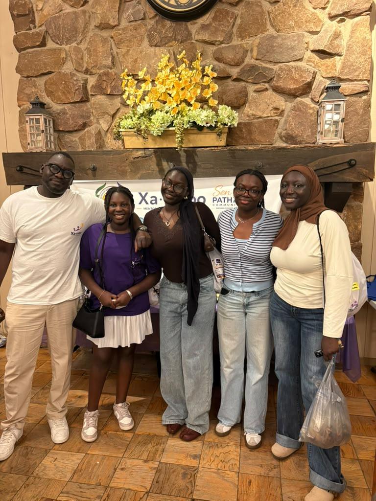 Xaritoo mentors gathered at a community event