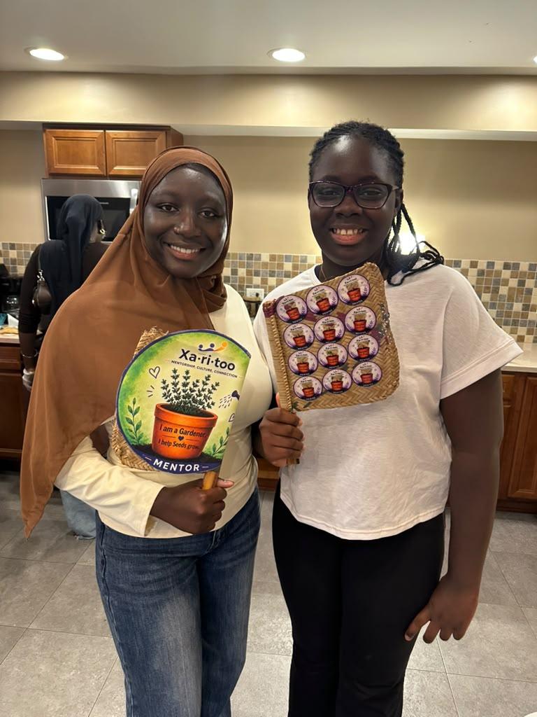 A Xaritoo mentor and mentee celebrating their connection